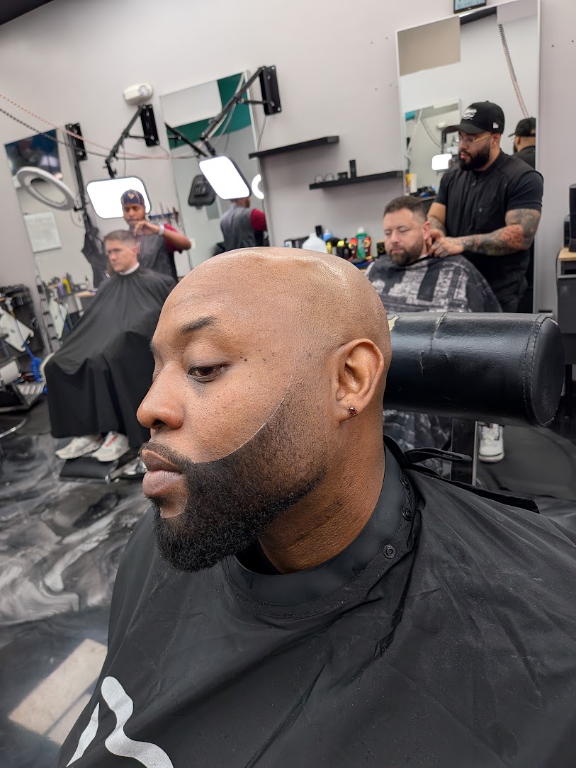 Bald fade with sharp beard line-up, cut by The Head Sculptor